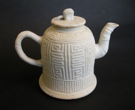 Blue White : Small winepot in biscuit with Shou character decor  - 18° century