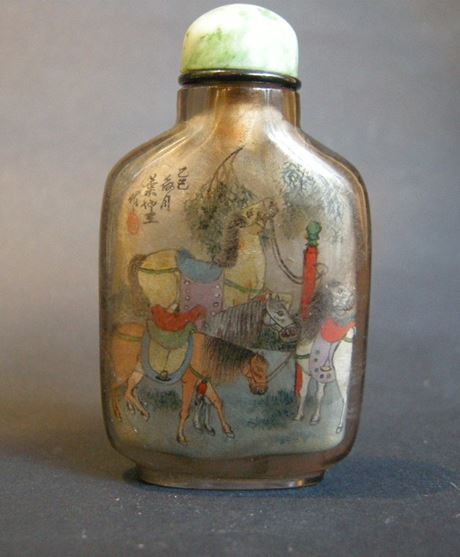 Snuff Bottles : snuff bottle Inside painted  in rock Crystal smoked  decorated with eight horses  painted and signed by Ye Zhongsan 1925