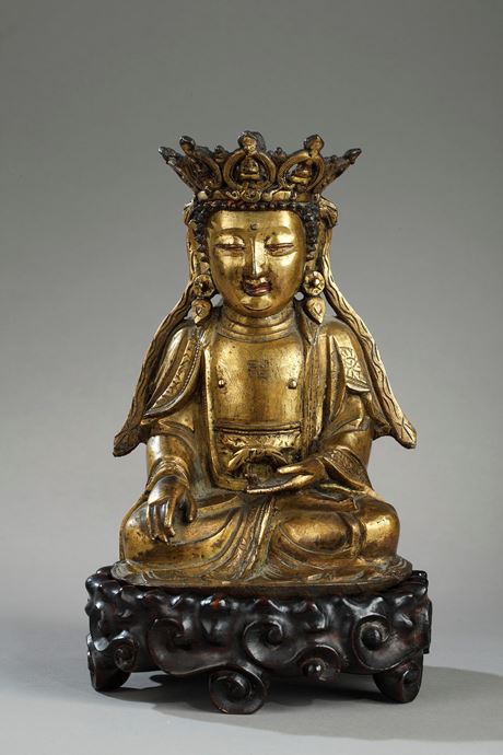 Works of Art : Figure of Bodhisattva  Gold bronze and sitting in padmasana  the hands in bhumisparsa mudra -
Ming period 1600/1640 - (H 17,5cm)
Wood stand 
