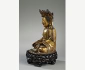 Works of Art : Figure of Bodhisattva  Gold bronze and sitting in padmasana  the hands in bhumisparsa mudra -
Ming period 1600/1640 - (H 17,5cm)
Wood stand 
