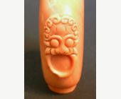 Snuff Bottles : rare coral snuff bottle sculpted with mask and ring handles  -

1800/1850