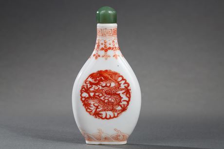 Snuff Bottles : Snuff bottle porcelain piriform painted in iron red  on each faces with a Dragon - Imperial kilns Daoguang mark and period  1821/1850 