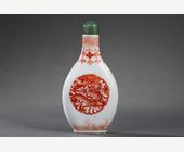 Snuff Bottles : Snuff bottle porcelain piriform painted in iron red  on each faces with a Dragon - Imperial kilns Daoguang mark and period  1821/1850 