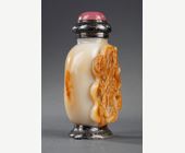 Snuff Bottles : Snuff bottle slightly yellow jade sculpted of the russet vein with two chilongs mounted in silver by Maquet Paris in 1930/40 to make a lighter - circa 1800/50 (bottle)