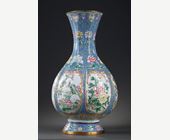 Works of Art : Vase  Canton polychrom enamel decorated on six panels with birds and flowers - Circa 19th century -
H 33,5cm