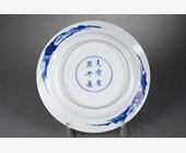 Blue White : Chinese blue and white porcelain plate with two long Eliza in a garden in front of a censer 
Kangxi mark and period (1662/1722)