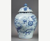 Blue White : Vase in blue white porcelain and its cover  decorated with a dragon with four claws in the clouds  Period  Shunzi 1644/1661 (first emperor of Qing)