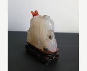 Works of Art : Miniature rock in carved agate  Meng Haoran and his servant and bats (Transformed in a snuffbottle) stopper  in carnelian in the shape of a squirrel -
China 1880/1940