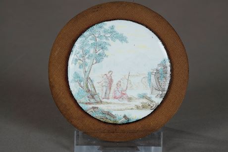 Works of Art : A Small Mid-18th Century English Enamel on Copper Circular Plaque, Probably Birmingham or Battersea. Finely painted using muted colours with a classical scene of a soldier seated next to a standing woman, to their left is a large overgrown urn and the remnants of classical objects can be seen scattered around in the foreground. The hazy distance is depicted in feint blue with an Italian landscape under a yellow sky. The back is inscribed and dated 1867. The inscription “This belonged to Sarah Duchess of Richmond who died in 1751 & was given to me by her granddaughter …(illegible)… aunt Lady Louisa in 1790 when I was 7 years old. I give it to my granddaughter Emily L. M (Bunbury?) aged 6 in 1867.”. It is then inscribed by Emily with her maiden name underneath (difficult to read). Sarah Lennox, Duchess of Richmond (née Cadogan; September 1705 – 25 August 1751), was Lady of the Bedchamber to Queen Caroline from 1724 to 1737. She was a collector and was the mother of the Lennox sisters. Below is a painting of The Duke and the Duchess of Richmond, by Jonathan Richardson. This portrait was made at the request of the Duke’s grandmother Louise de Kérouaille, who wanted a portrait of her grandson and his wife.

Diameter of enamel on copper 5 cm 