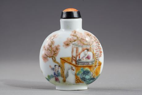 Snuff Bottles :  snuff bottle polychrome porcelain with decoration of tree and bamboo and a calligraphy on one side and the other of a child in a garden and a man in a pavilion - China Jingdezhen kilns  mark and period Daoguang 1821/1850