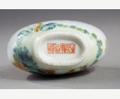 Snuff Bottles :  snuff bottle polychrome porcelain with decoration of tree and bamboo and a calligraphy on one side and the other of a child in a garden and a man in a pavilion - China Jingdezhen kilns  mark and period Daoguang 1821/1850