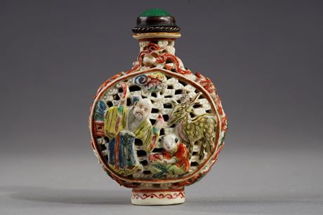 Snuff Bottles : Snuff bottle porcelain molded and reticulated with decor Shou Lao deer and children on a face  and other face with two figures and children  and Buddhist emblems on the sides - Imperial Jingdezhen kilns  Jiaqing mark and period 1796/1820