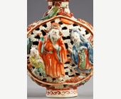 Snuff Bottles : Snuff bottle porcelain molded and reticulated with decor Shou Lao deer and children on a face  and other face with two figures and children  and Buddhist emblems on the sides - Imperial Jingdezhen kilns  Jiaqing mark and period 1796/1820