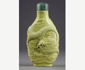 Snuff Bottles : snuff bottle porcelain enamelled yellow molded and sculpted with a dragon - Qianlong mark - 
School of Wang Bingrong - circa 1850
