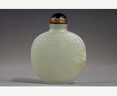 Snuff Bottles : Snuff bottle of oval shape flattened jade nephrite celadon decorated with numerous signs "Shou"
(longevity) in light relief - China 1750/1820