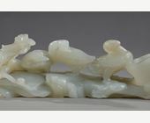 Works of Art : Nephrite celadon jade brush rest carved with three ducks next to a branch of prunus and also forming a water bucket - China 18/19em