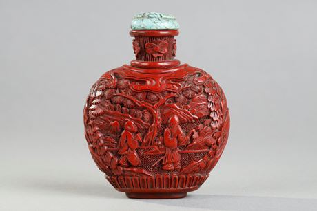 Snuff Bottles : Cinnabar red lacquer snuffbottle decorated with scholars under the pines . the sides decorated with rocks - China 19th century