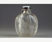 Snuff Bottles : Rock crystal snuff bottle sculpted in low relief with liu hai  , bat , crane . inscribed 
"shou shan fu hai" seal Wen Yuan - Rustic Crystal Master 1730/1880