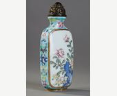 Snuff Bottles : Porcelain snuff bottle finely painted  with flowers and rock on a side  other side
with a poem of emperor Qianlong  - Imperial mark period Qianlong 1736/1795 