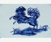 Blue White : Large dish with round edge in white blue porcelain bearing a decoration of a dog probably a epagneul
standing on its hind legs on the ground or growing Lingzi mushrooms - China Qianlong period 1736/1795