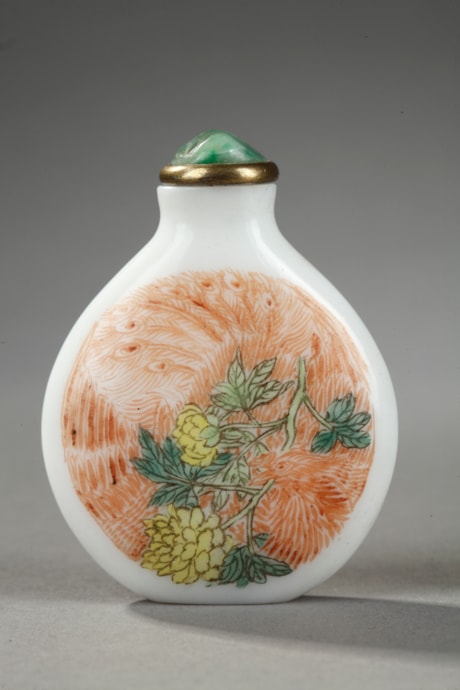 Snuff Bottles : glass enamelled snuff bottle decorated on a face with dragon and flowers and other face with phoenix and flowers mark qianlong - Yangzhou school -
circa 1770/1790