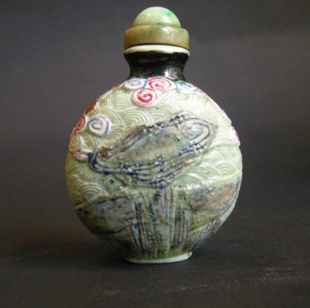 Snuff Bottles : Rare porcelain snuff bottle molded  probably immortal He Xiangu  - 19th century -