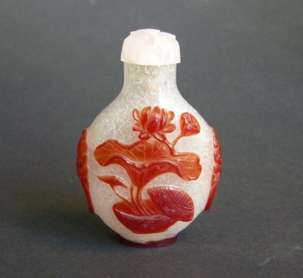 Snuff Bottles : snuff bottle glass  overlay red  with caligraphy on a face  and box and lotus  other face  -  1800/1870 -