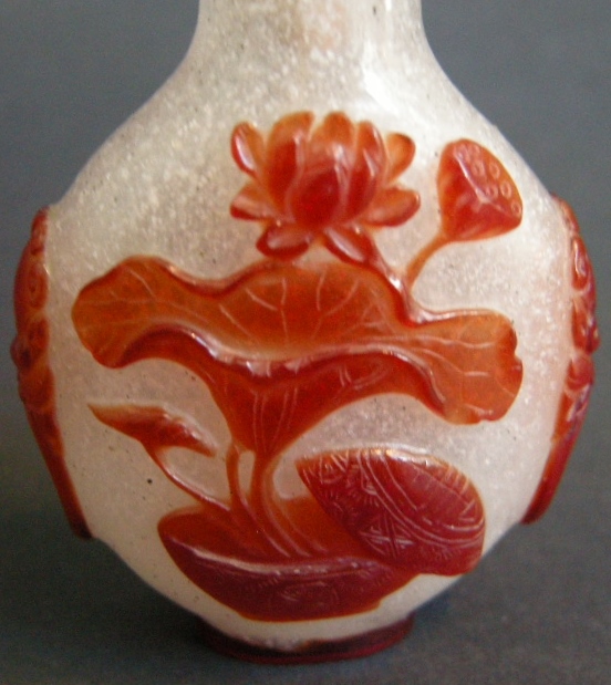 Snuff Bottles : snuff bottle glass  overlay red  with caligraphy on a face  and box and lotus  other face  -  1800/1870 -