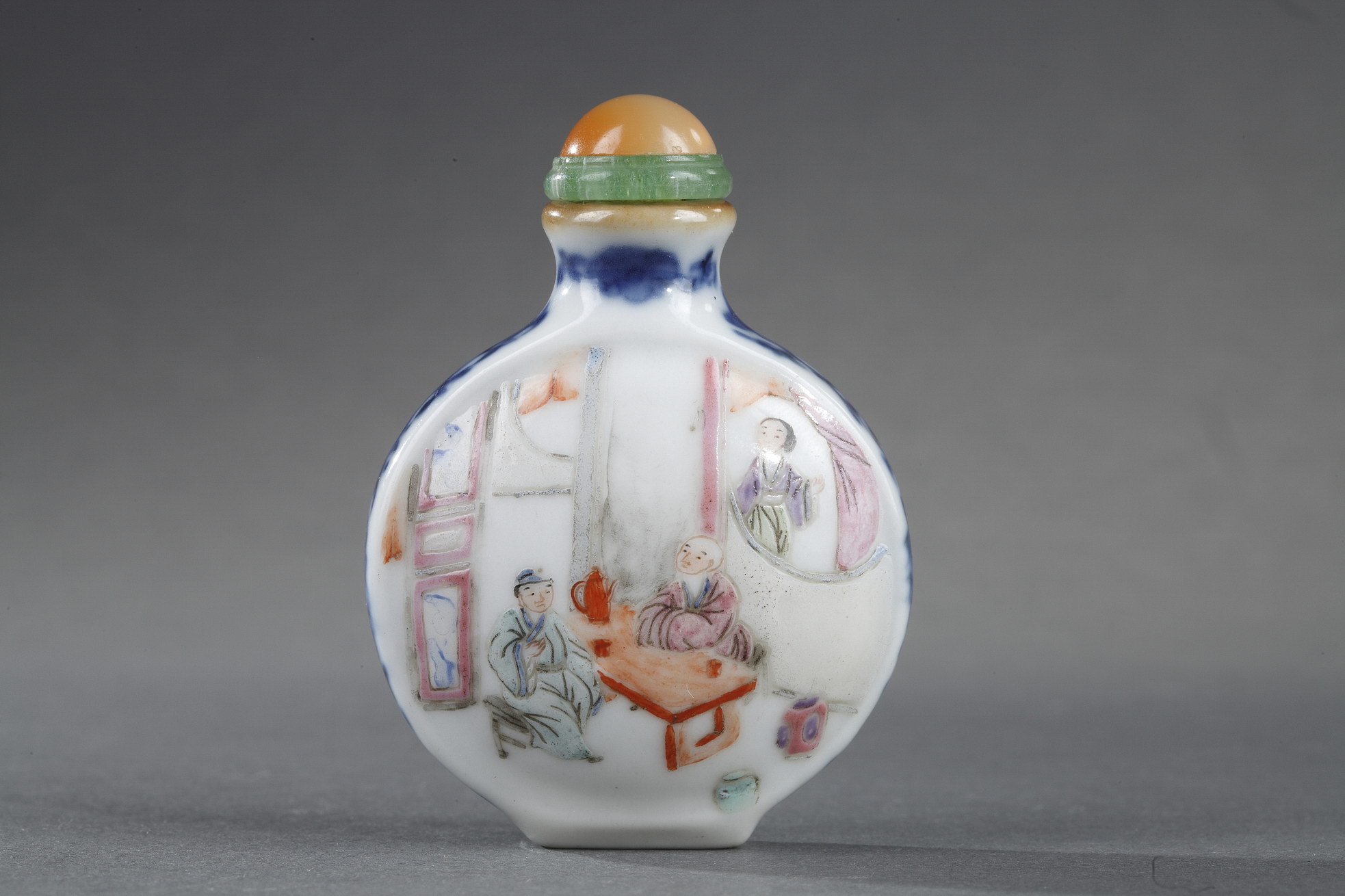 Snuff Bottles : Chinese polychrome porcelain  snuff bottle with interiors scenes the sides decorated underglaze blue scrolls
Imperial kilns Jingdezhen mark and period Jiaqing 1796/1820
H. 5,2cm
