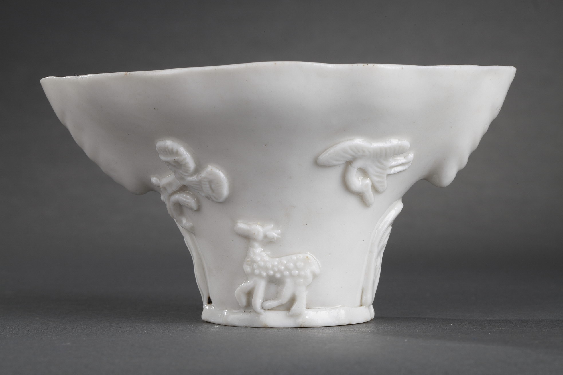 Blue White : Pair of "blanc de Chine" rhinoceros horn shaped cups with animals decoration like : tiger dragon deer or crane.
Dehua kilns (Fujian province) Kangxi period (1662/1722)