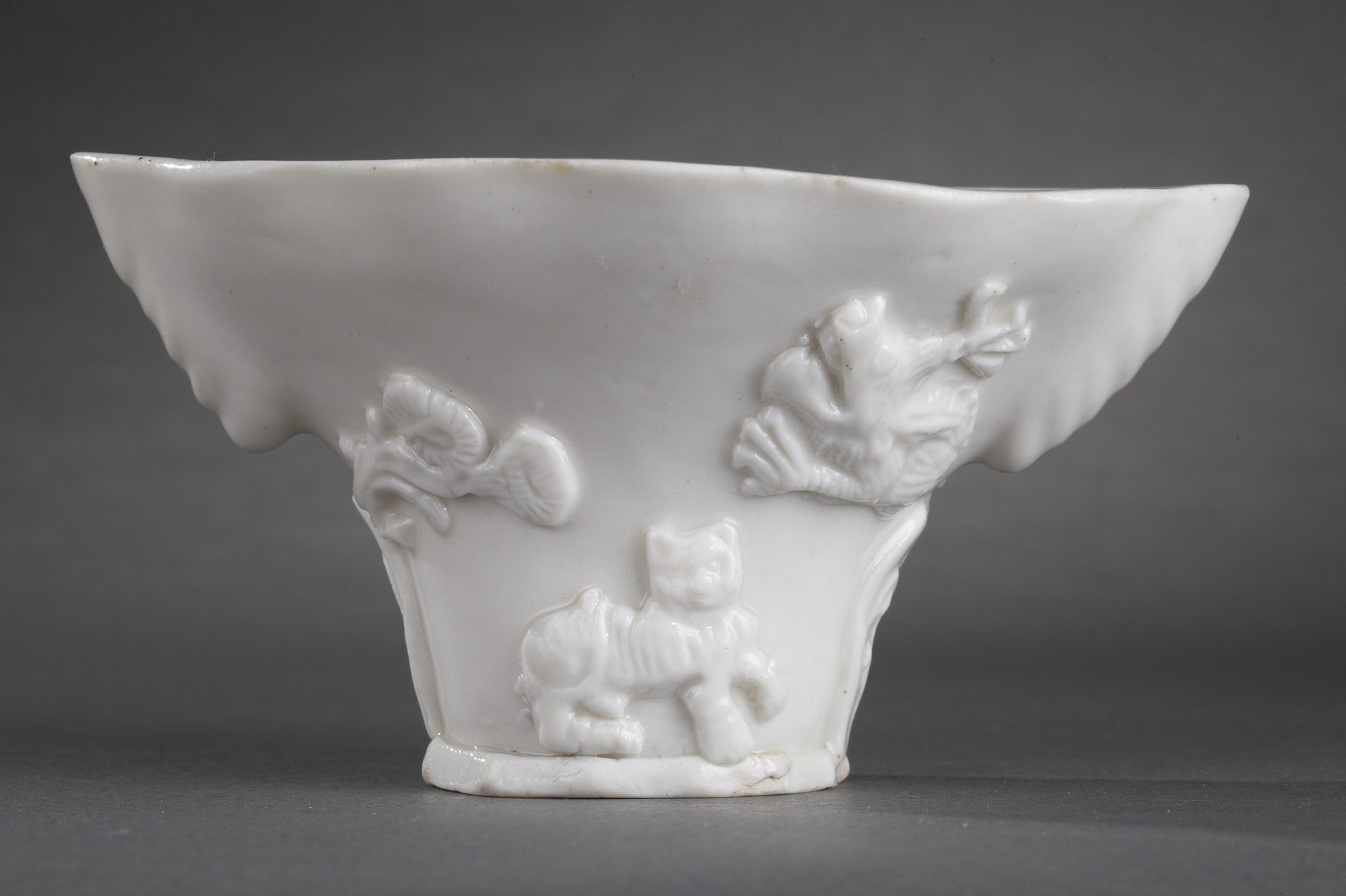 Blue White : Pair of "blanc de Chine" rhinoceros horn shaped cups with animals decoration like : tiger dragon deer or crane.
Dehua kilns (Fujian province) Kangxi period (1662/1722)