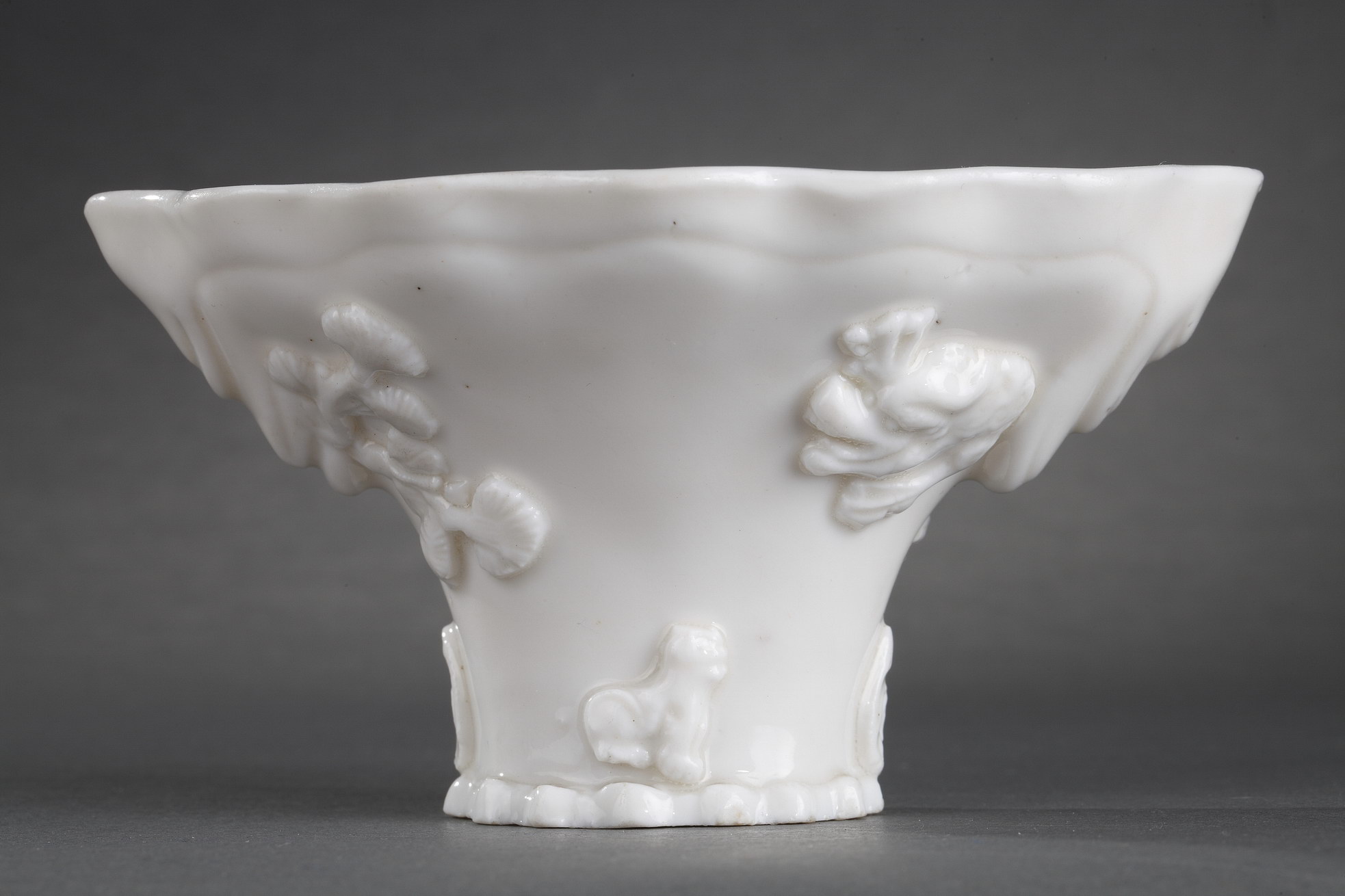 Blue White : Pair of "blanc de Chine" rhinoceros horn shaped cups with animals decoration like : tiger dragon deer or crane.
Dehua kilns (Fujian province) Kangxi period (1662/1722)