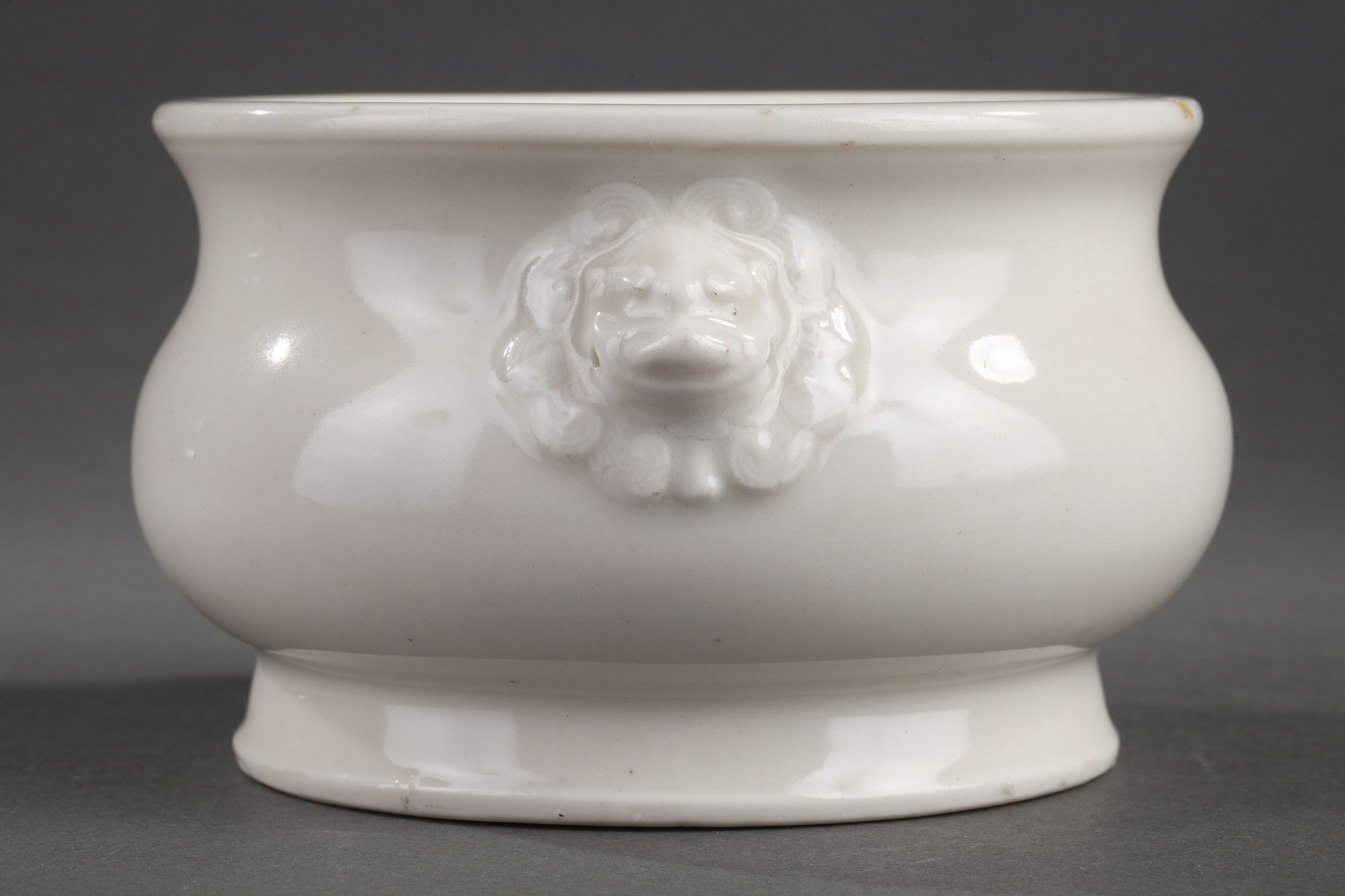 Blue White : Chinese blanc de Chine censer with lion masks - Stamped seal mark An Zhi on the base .
The character An  may refer to the workshop where the potters worked in the room --    in which the owner used the censer  -  Dehua kilns (  Fujian province )  - Kangxi period  1662/1722  -