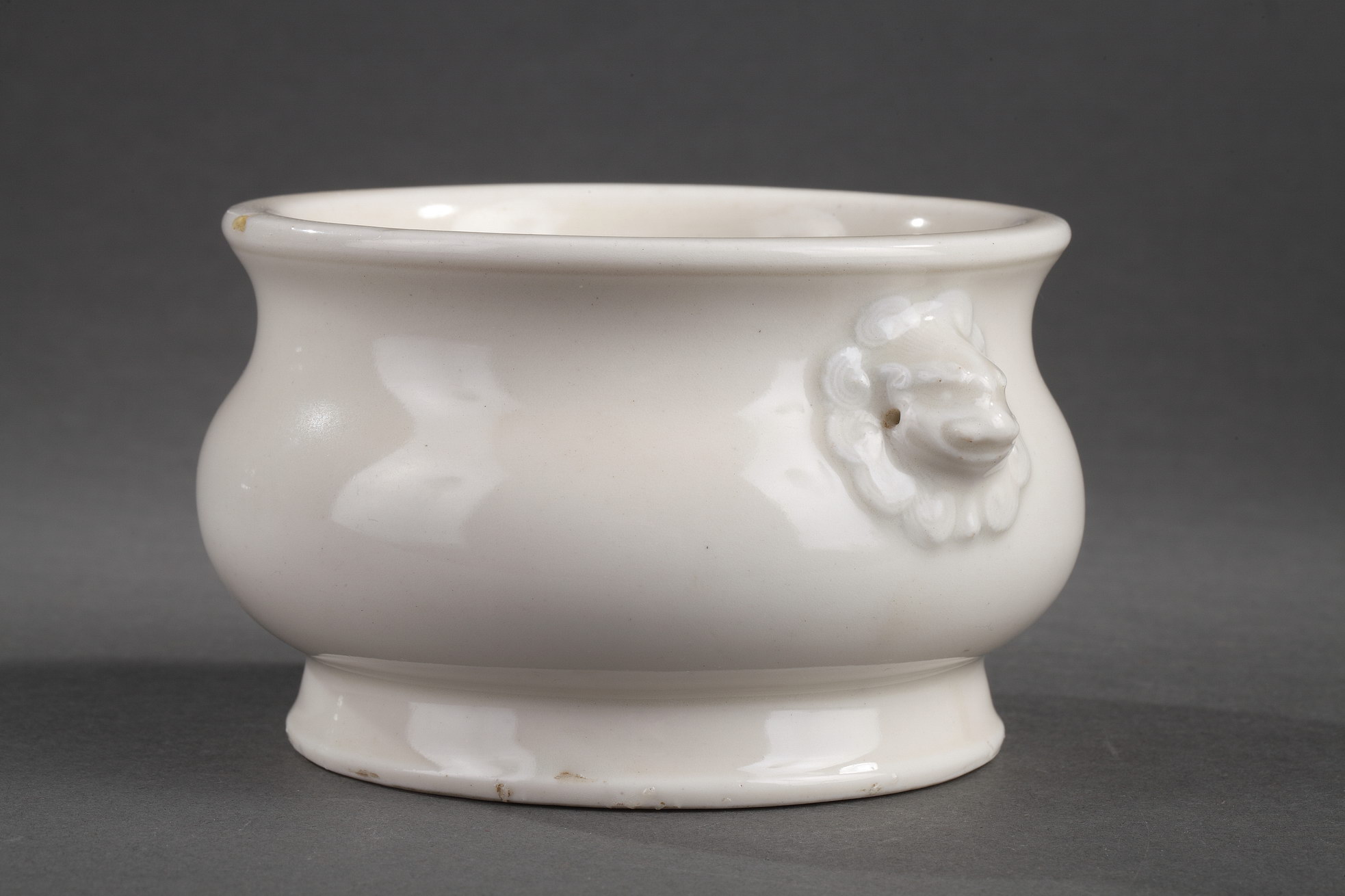 Blue White : Chinese blanc de Chine censer with lion masks - Stamped seal mark An Zhi on the base .
The character An  may refer to the workshop where the potters worked in the room --    in which the owner used the censer  -  Dehua kilns (  Fujian province )  - Kangxi period  1662/1722  -
