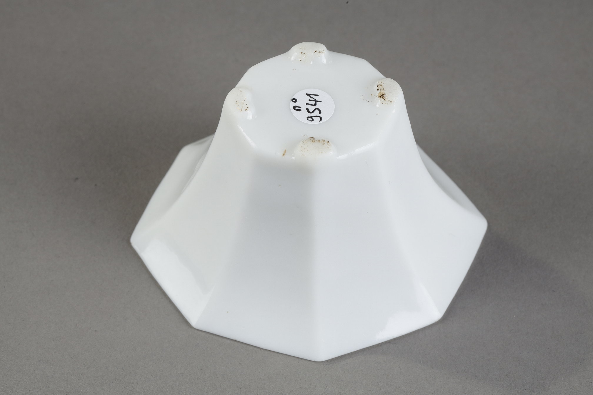 Blue White : Small cup blanc de Chine porcelain octogonal shape with caligraphy incised 
Dehua kilns Fujian province   Kangxi period 1662/1722