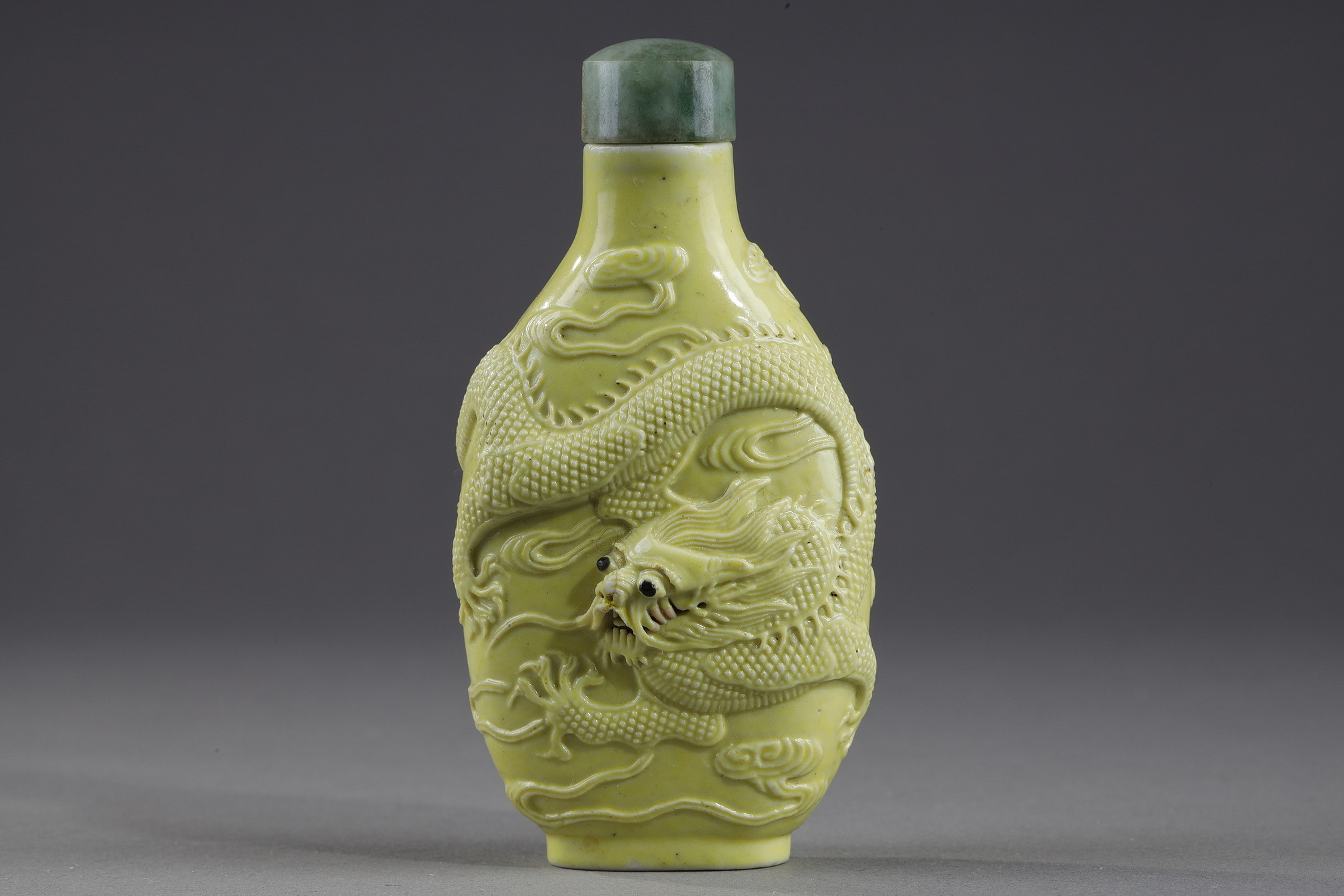 Snuff Bottles : snuff bottle porcelain enamelled yellow molded and sculpted with a dragon - Qianlong mark - 
School of Wang Bingrong - circa 1850
