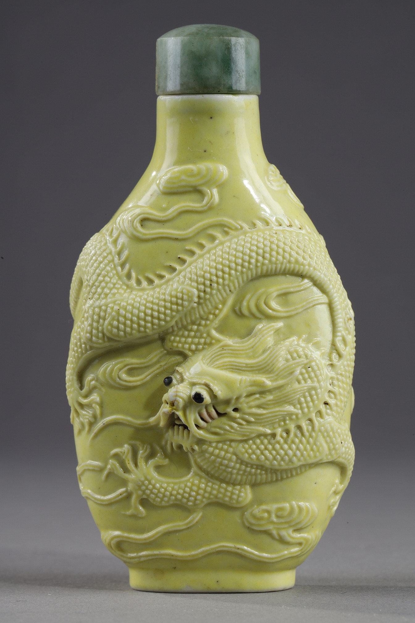 Snuff Bottles : snuff bottle porcelain enamelled yellow molded and sculpted with a dragon - Qianlong mark - 
School of Wang Bingrong - circa 1850