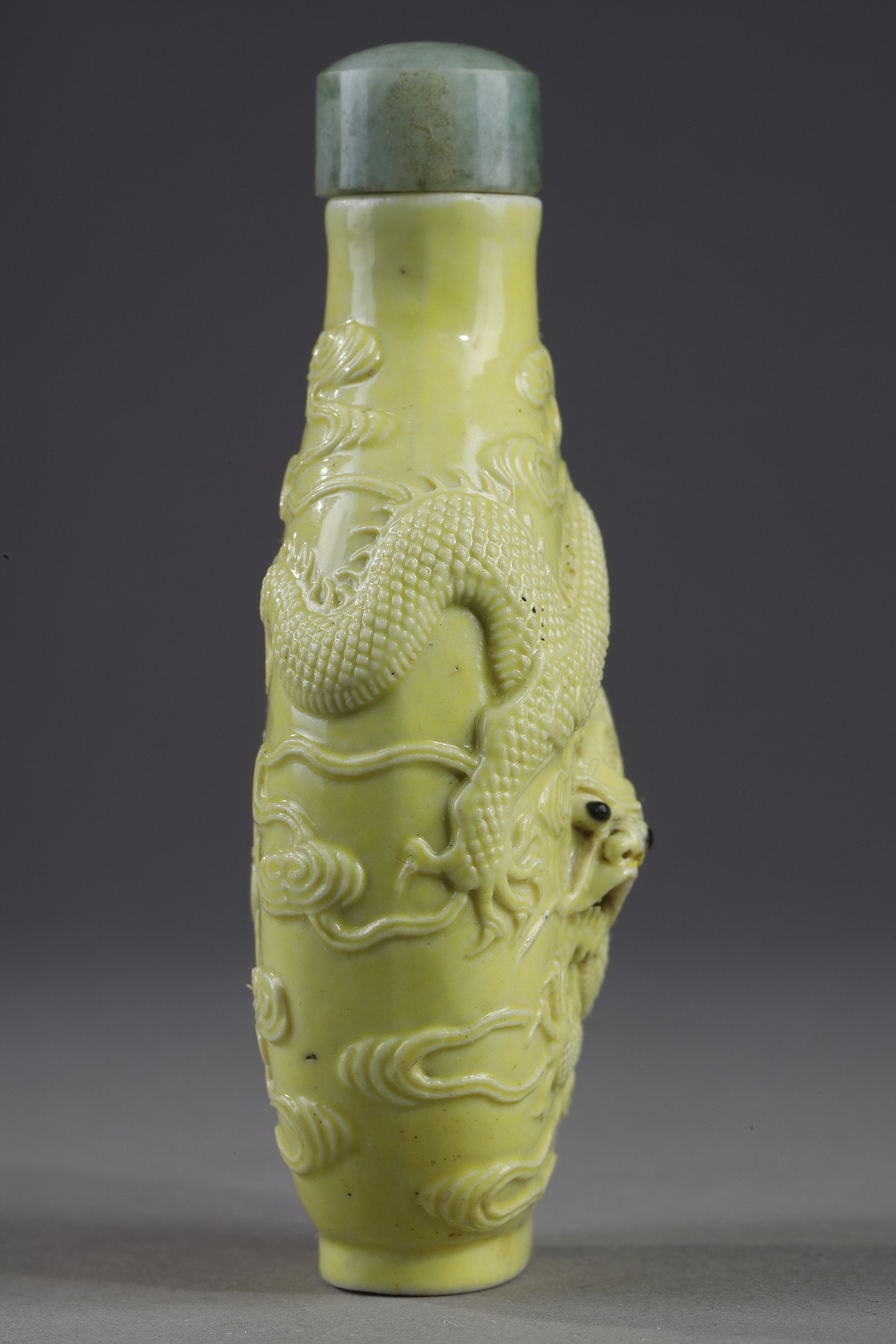 Snuff Bottles : snuff bottle porcelain enamelled yellow molded and sculpted with a dragon - Qianlong mark - 
School of Wang Bingrong - circa 1850
