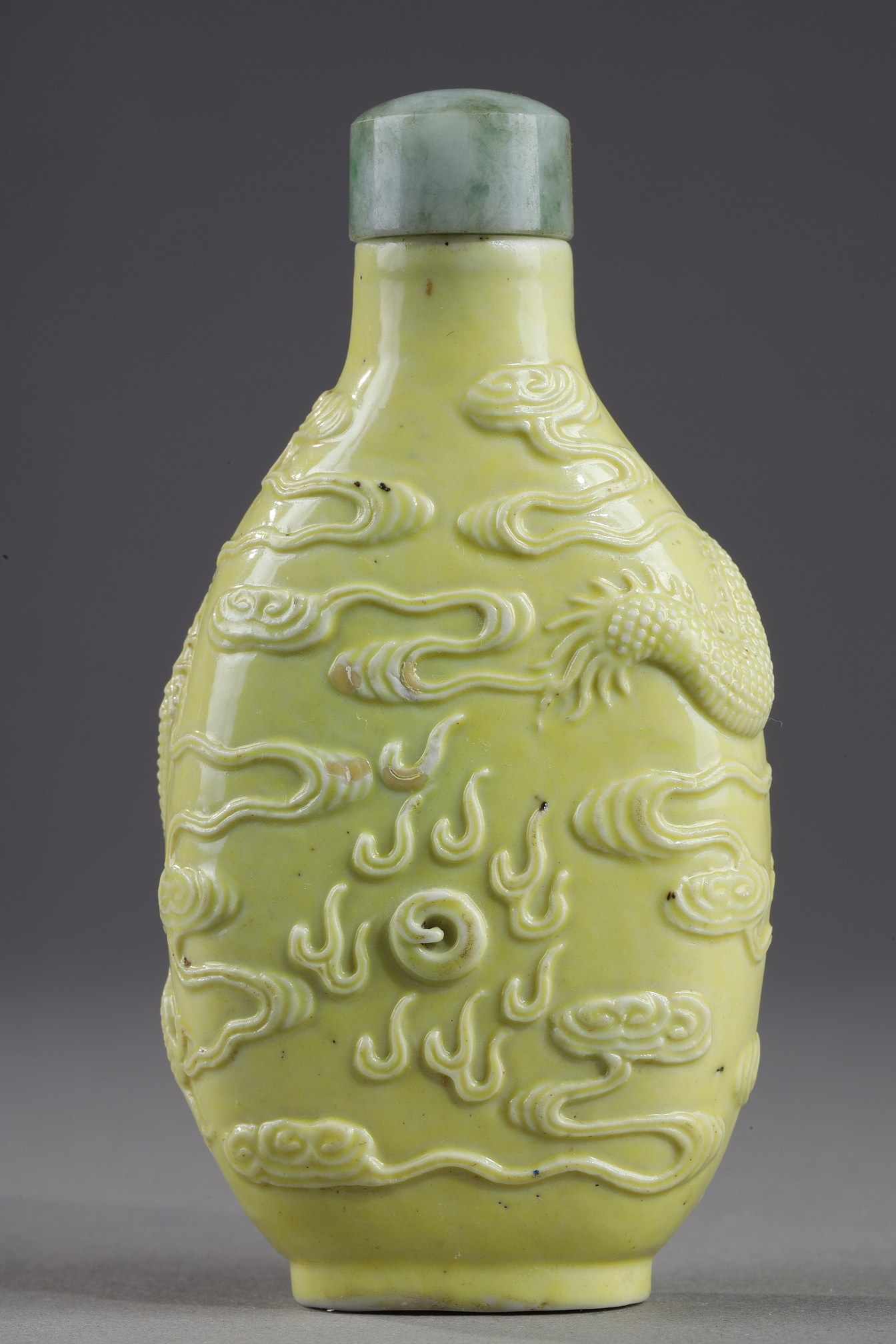 Snuff Bottles : snuff bottle porcelain enamelled yellow molded and sculpted with a dragon - Qianlong mark - 
School of Wang Bingrong - circa 1850