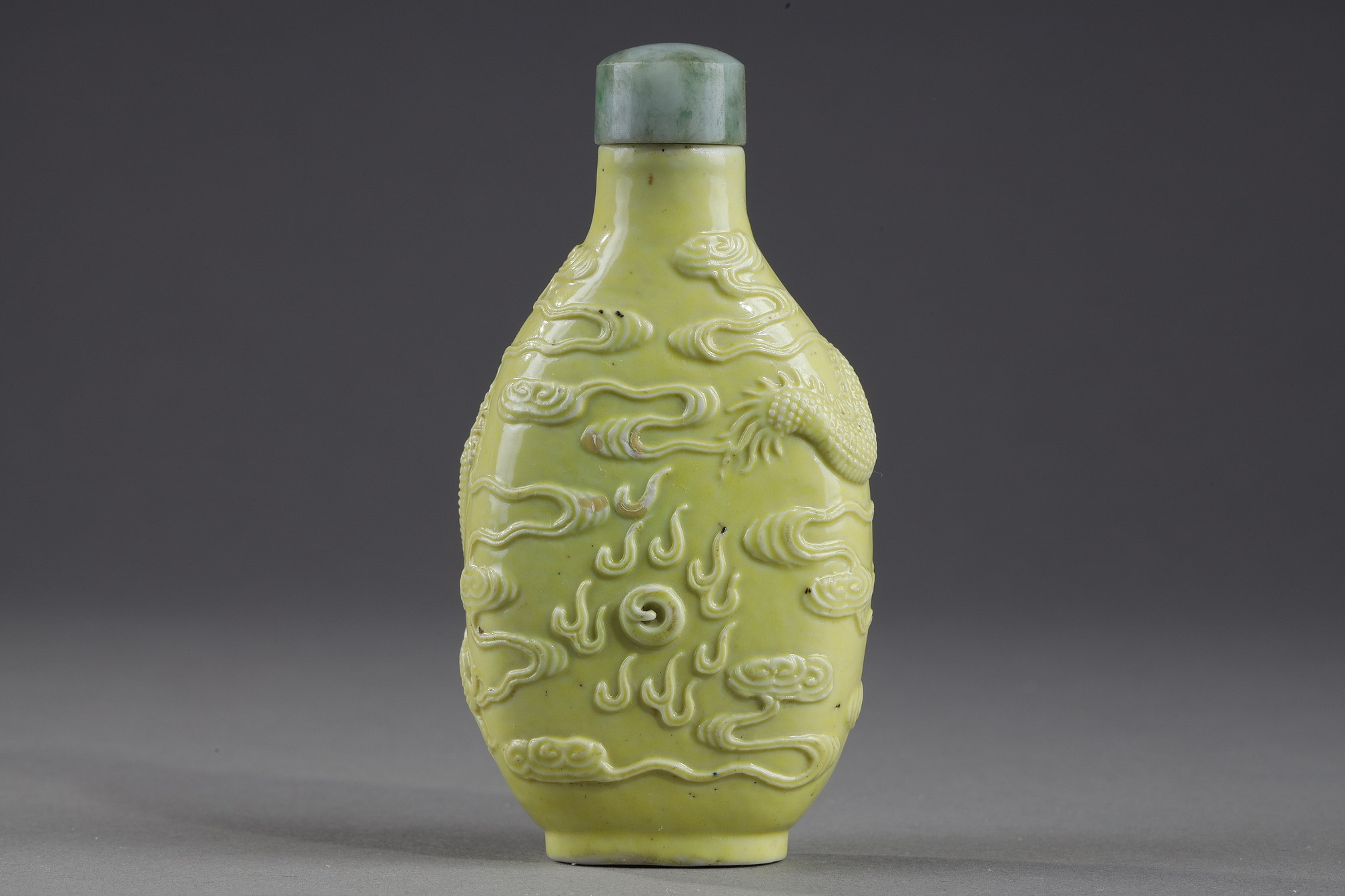 Snuff Bottles : snuff bottle porcelain enamelled yellow molded and sculpted with a dragon - Qianlong mark - 
School of Wang Bingrong - circa 1850