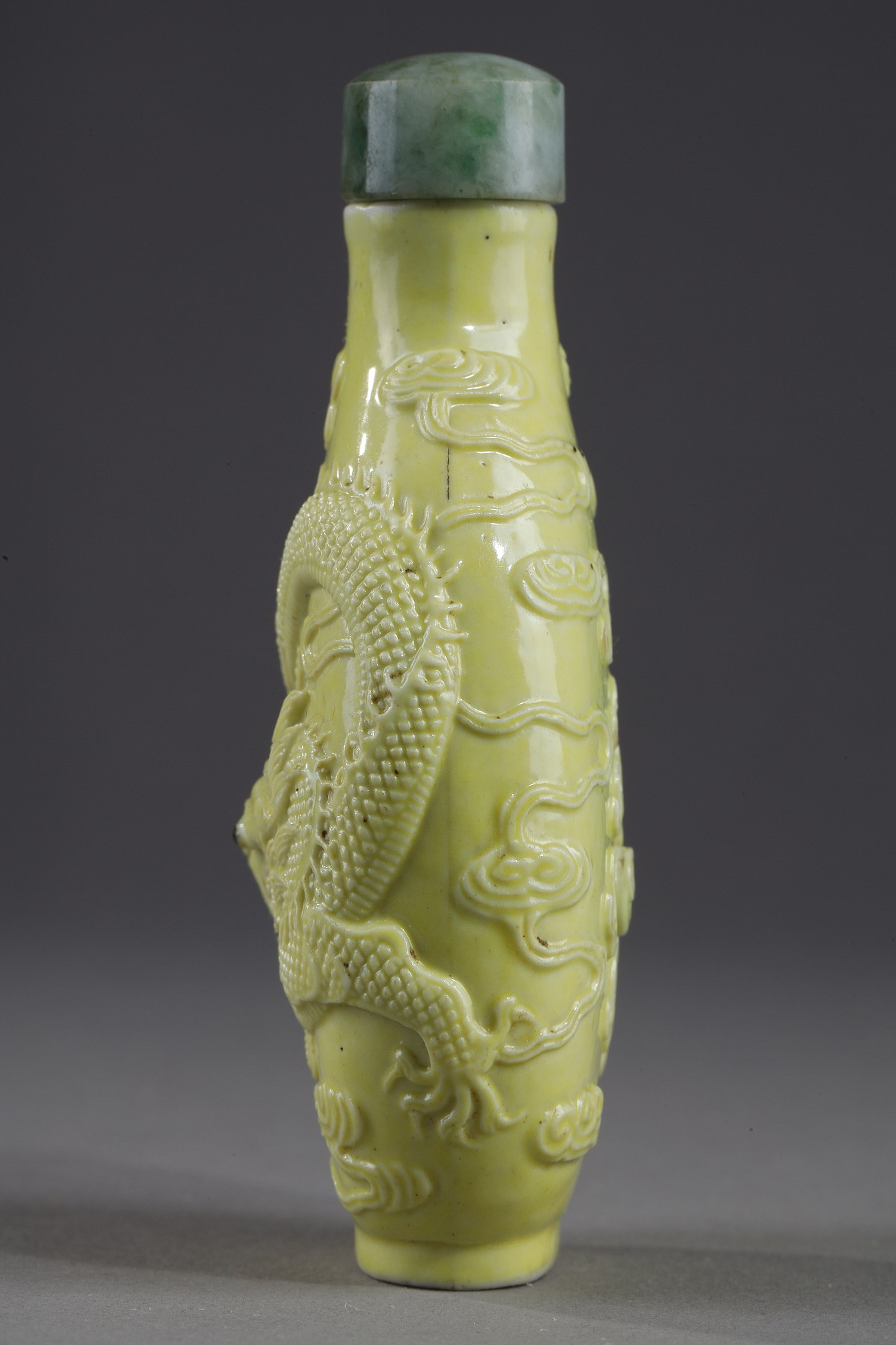 Snuff Bottles : snuff bottle porcelain enamelled yellow molded and sculpted with a dragon - Qianlong mark - 
School of Wang Bingrong - circa 1850