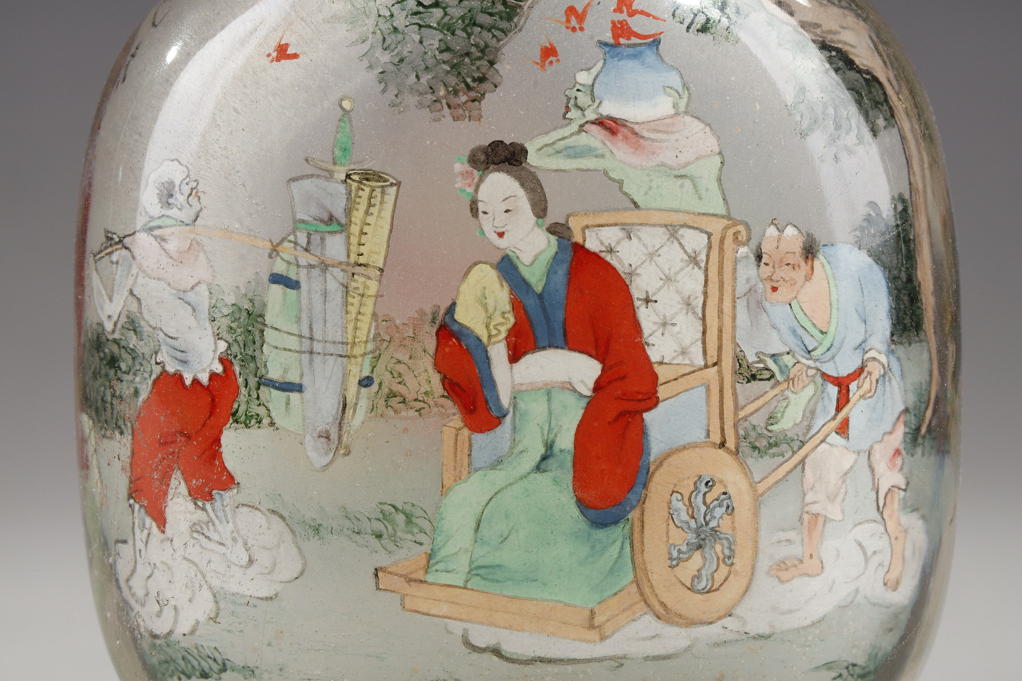 Snuff Bottles : Rock crystal snuff bottle painted in its interior of Zhong Kui surrounded by demons on one side and on the other the sister of Zhong Kui on a char signed by Ye Zhongsan and dated 1919