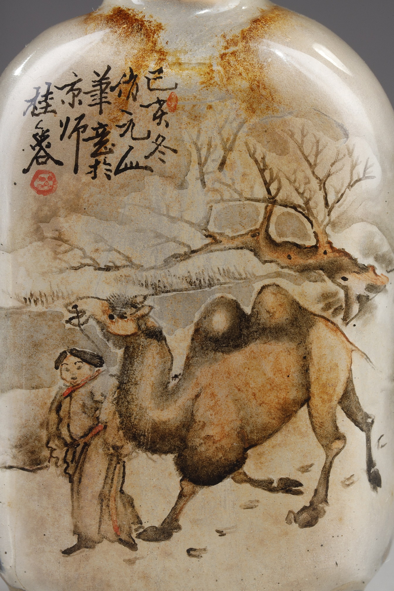 Snuff Bottles : -Snuff bottle in glass inside painted with a rider and his servant with calligraphy on one side and on the other of a camel man and camel  -Signed by Gui Xianggu and dated 1899 