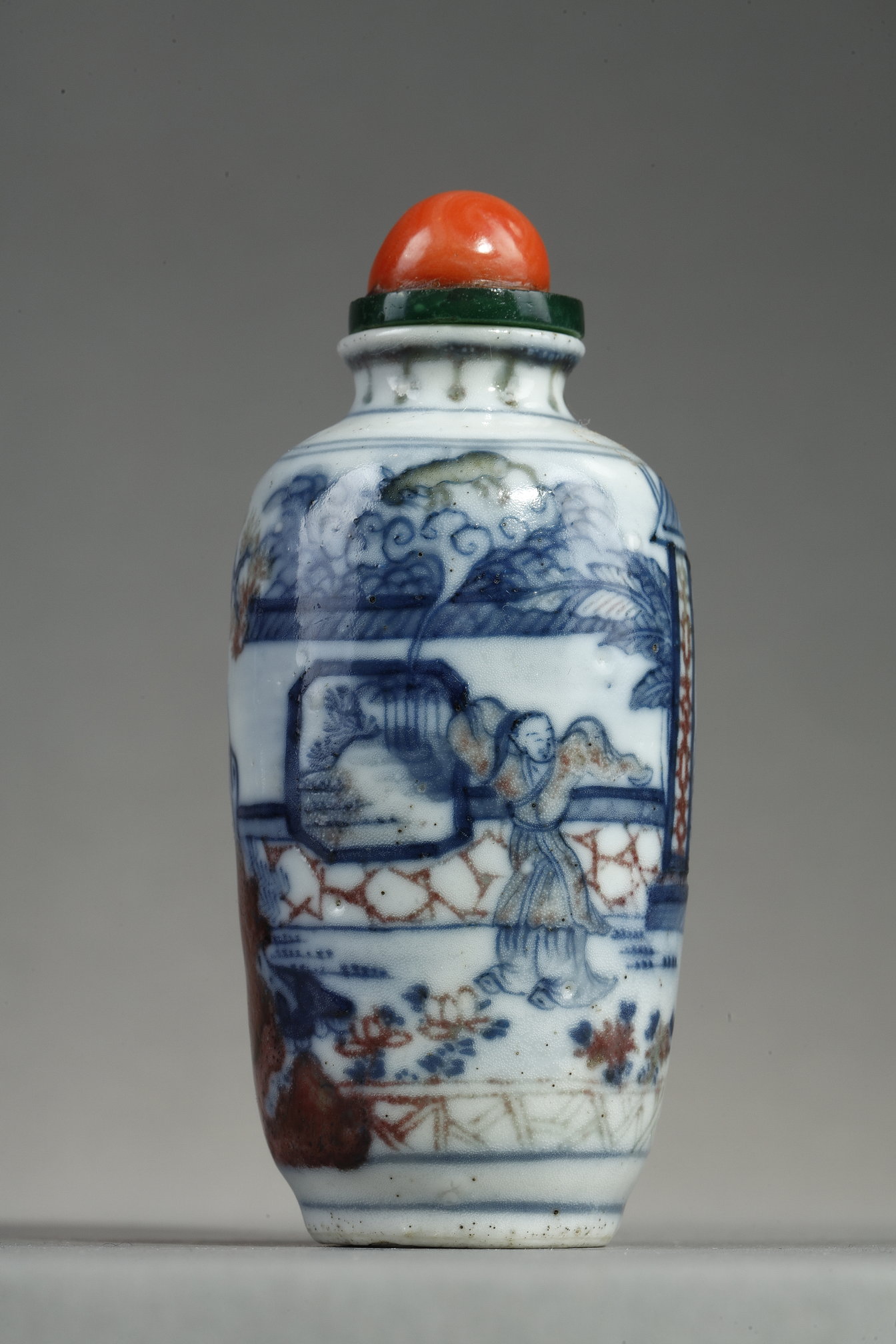 Snuff Bottles : Enameled snuff bottle painted in underglaze blue  and red copper with a decor of an interior scene with
the ghostly "Gui" - Apocryphal mark Qianlong - 19th century China
