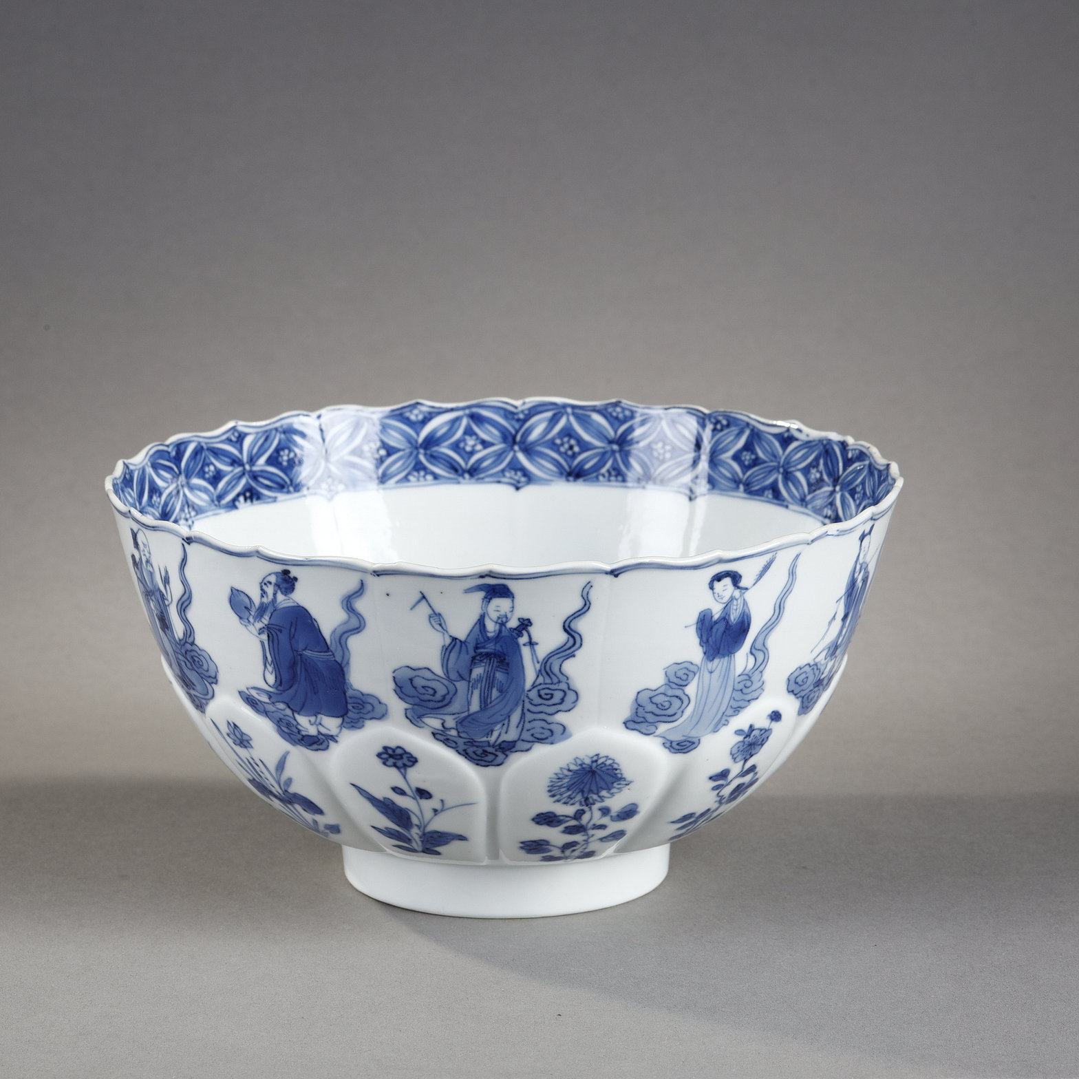 Blue White : porcelain bowl "blue white" molded in the shape of flower petals and decorated with immortals 
Kangxi mark and period  1662/1722