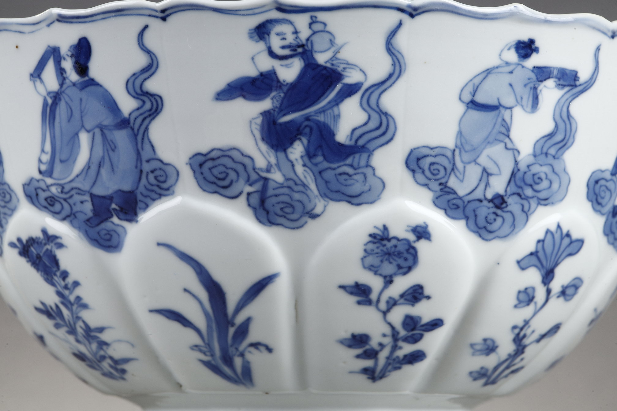 Blue White : porcelain bowl "blue white" molded in the shape of flower petals and decorated with immortals 
Kangxi mark and period  1662/1722