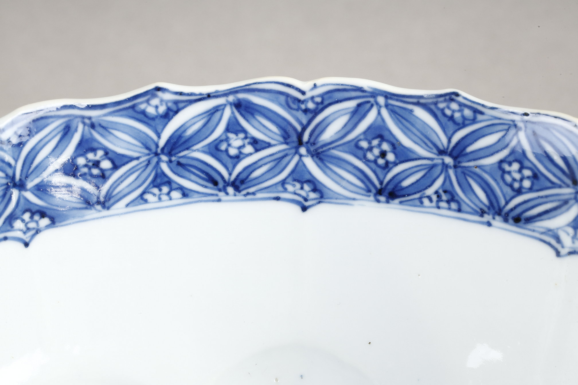 Blue White : porcelain bowl "blue white" molded in the shape of flower petals and decorated with immortals 
Kangxi mark and period  1662/1722