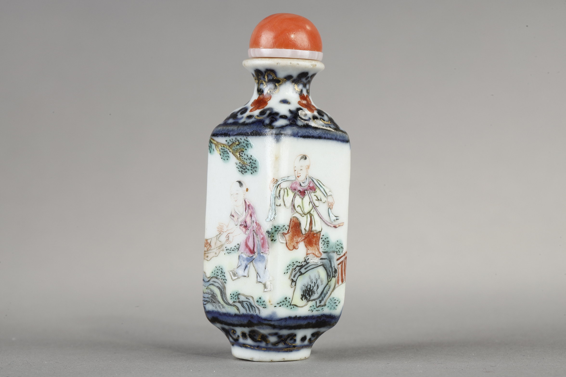 Snuff Bottles : Porcelain quadrangular snuff bottle with a child on each side - China mark and period Qianlong around 1790 /95