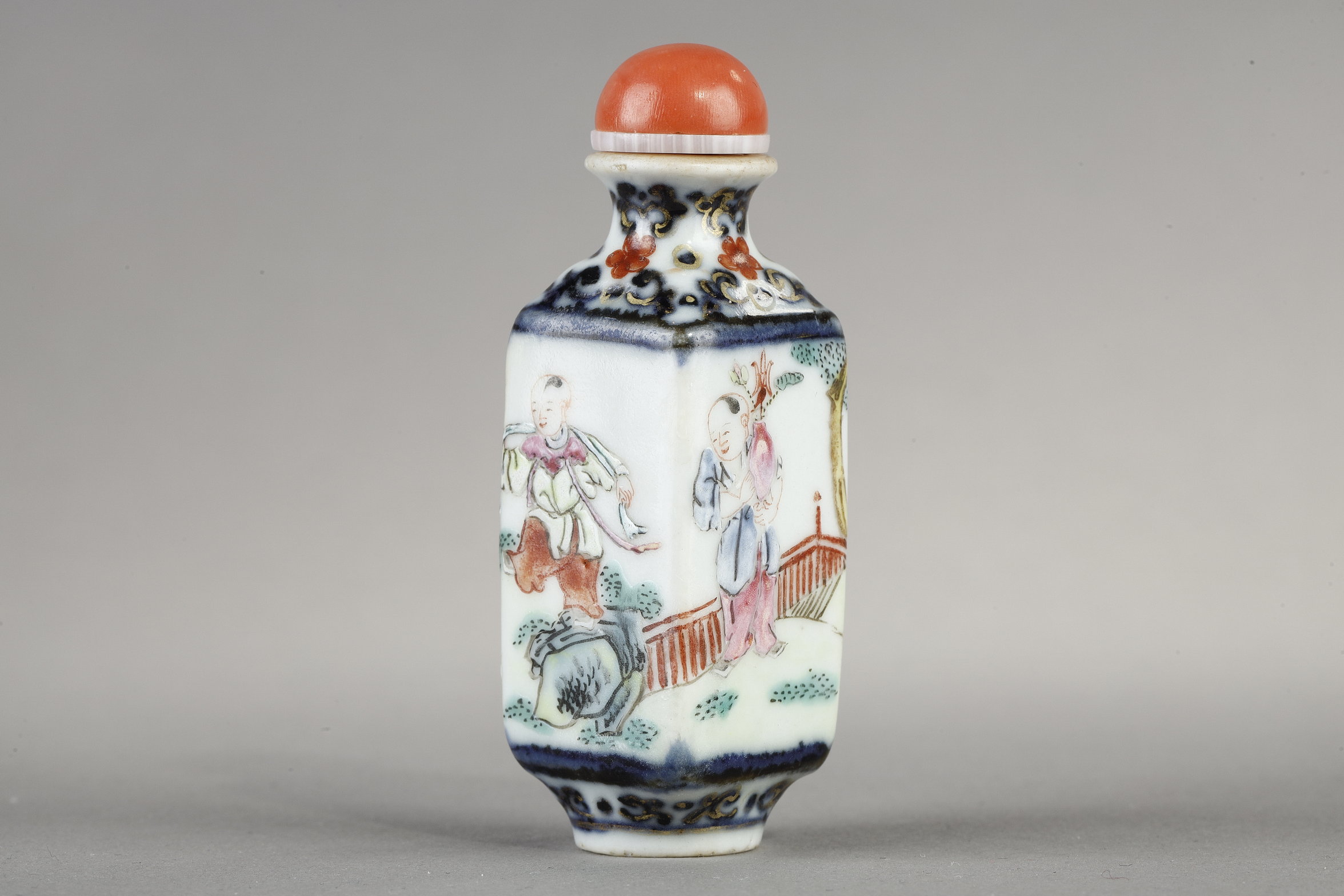 Snuff Bottles : Porcelain quadrangular snuff bottle with a child on each side - China mark and period Qianlong around 1790 /95