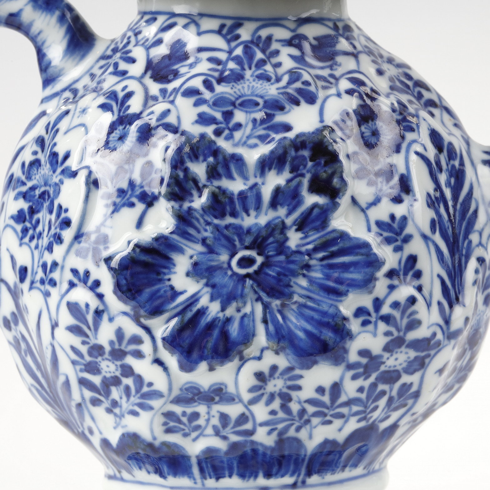 Blue White : Rare blue white porcelain molded with flowers foliage and birds  . The handle shaped branch
China Kangxi Period 1662/1722